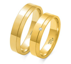 Obrączka ślubna grawerowana złota 585  z diamentami