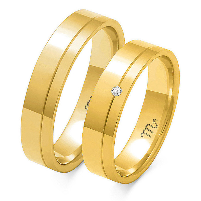 Obrączka ślubna grawerowana złota 585 z diamentami Obrączka ślubna grawerowana złota 585 z diamentami