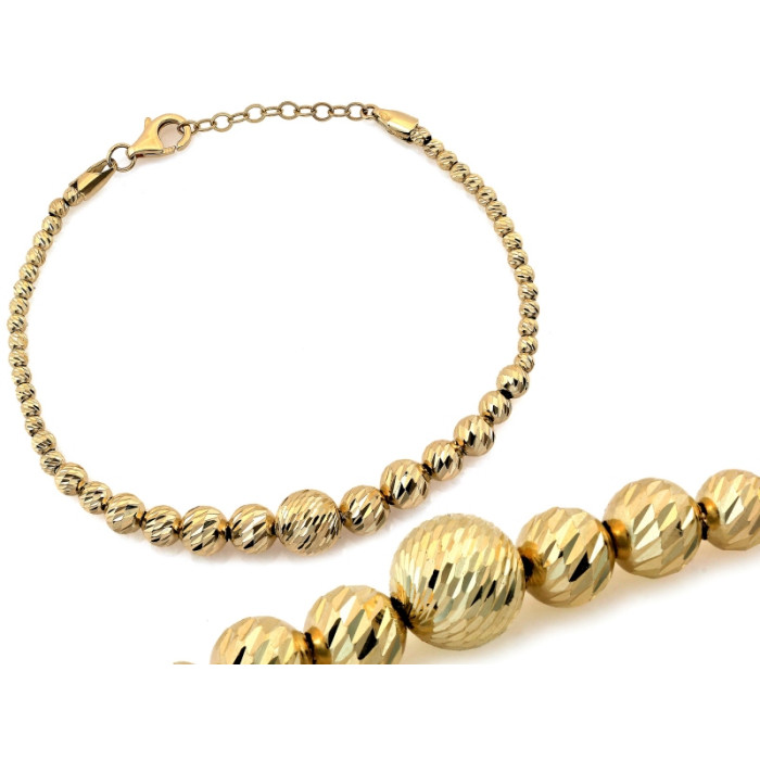 Złota bransoletka 585 elegancka z błyszczących kulek różnej wielkości 14k Złota bransoletka 585 elegancka z błyszczących kulek różnej wielkości 14k