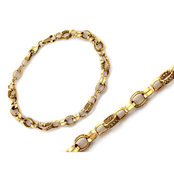Elegancka złota bransoletka 375 z ażurowymi wstawkami i małych obręczy długość 19cm 9k Elegancka złota bransoletka 375 z ażurowymi wstawkami i małych obręczy długość 19cm 9k