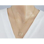Złota zawieszka 585 z literką D i ażurowym zdobieniem elegancka 14k