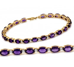 Złota bransoletka 585 z fioletowymi owalnymi cyrkoniami długość 19cm 14k