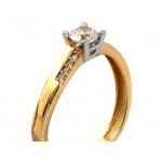 Elegancki złoty pierścionek 585 zaręczynowy z oszlifowanym oczkiem 14k