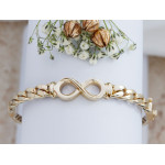 Nowoczesna złota bransoletka 585 sztywna z symbolem nieskończoności 17cm 14k
