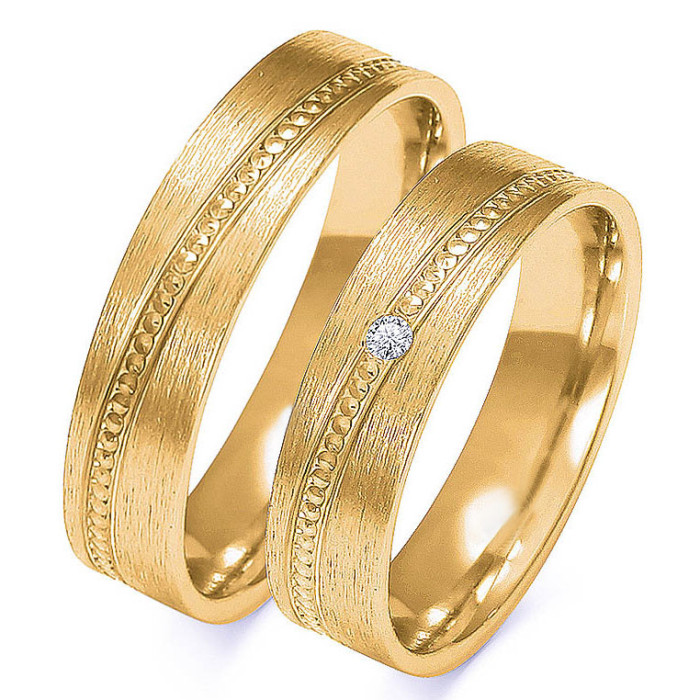 Obrączka ślubna złota 333 zdobienie i diamencik Obrączka ślubna złota 333 zdobienie i diamencik