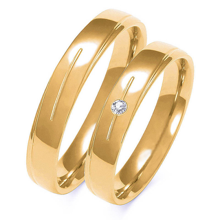 Obrączka ślubna złota 333 z delikatnym diamencikiem Obrączka ślubna złota 333 z delikatnym diamencikiem